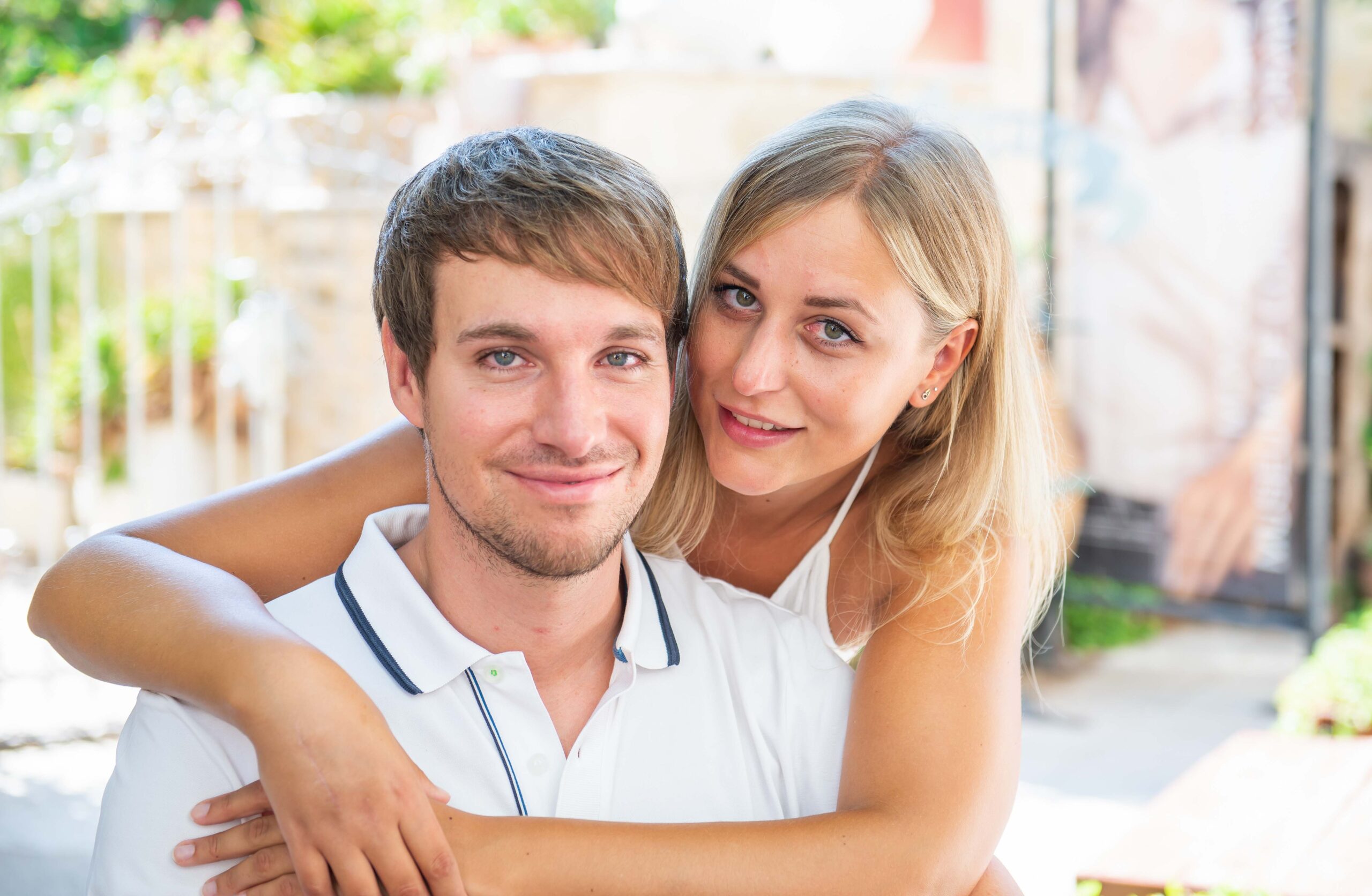 Young couple at hug smiling