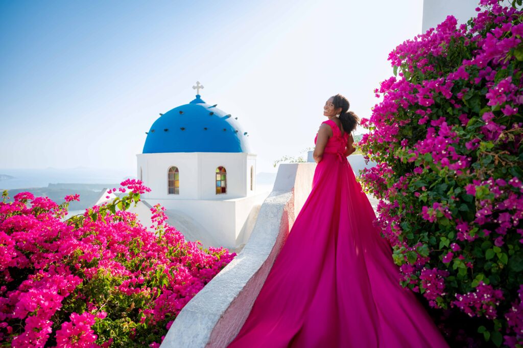Lady getting portrait with a bougainvilleas flowers around her