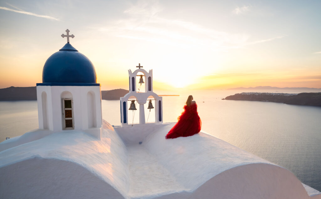 Landscape view from Scaros rock showing beautiful golden hour and Oia village